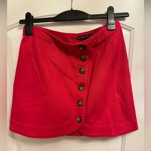 Abercrombie & Fitch mini skirt, red denim material. Size Small.
